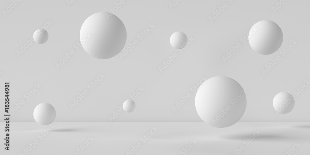 Suspended balls on a white background. 3D image rendering.