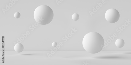 Suspended balls on a white background. 3D image rendering. © Whales Factory