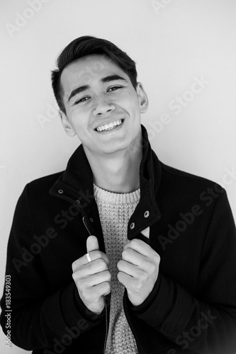 Portrait of a young man who laughs. The emotion of happiness and joy