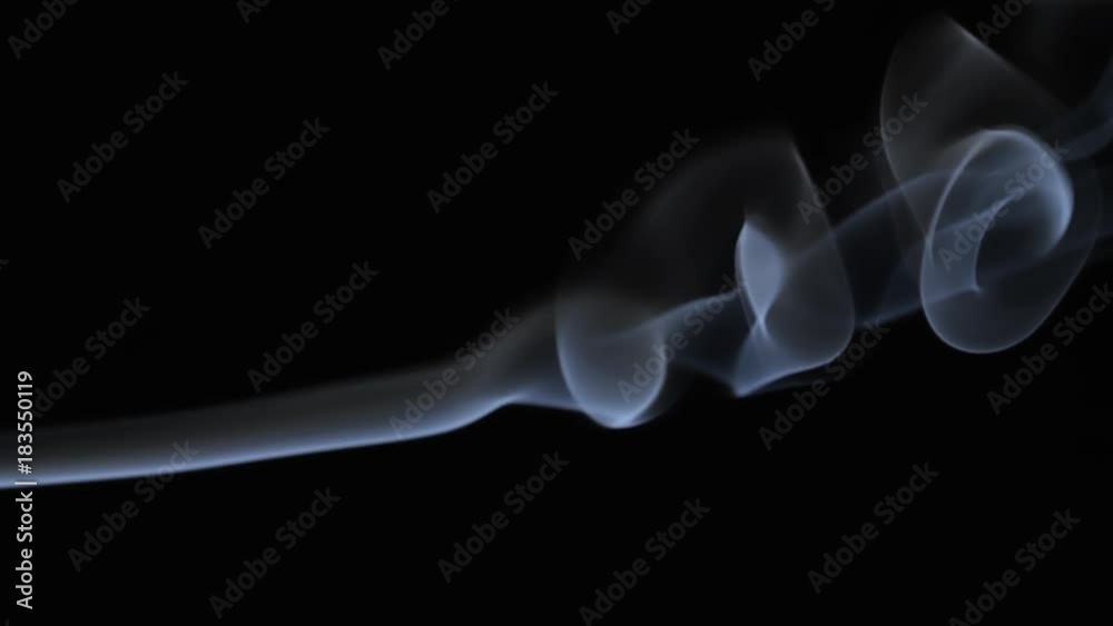 White tobacco smoke line cloud on black background 4k slow-motion video with copy space. Smoking wave floating steaming: cigarette, cigar, vaping, pipe. Nicotine addiction White tobacco smoke line cloud on black background 4k slow-motion video with copy space. Smoking wave floating steaming: cigarette, cigar, vaping, pipe. Nicotine addiction