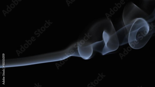 White tobacco smoke line cloud on black background 4k slow-motion video with copy space. Smoking wave floating steaming: cigarette, cigar, vaping, pipe. Nicotine addiction