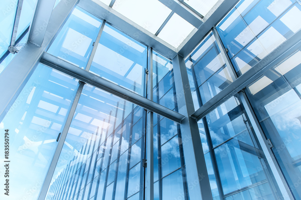 steel blue glass high rise building skyscrapers, business concept of successful industrial architecture steel blue glass high rise building skyscrapers, business concept of successful industrial architecture
