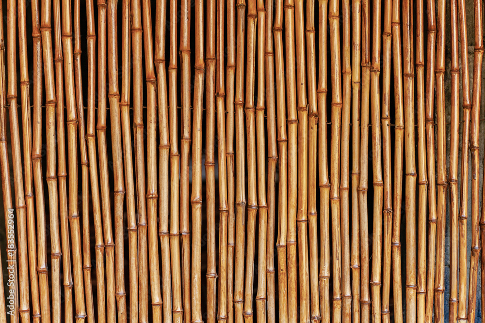 Texture of wooden boards and planks. Bamboo sticks. Texture of wooden boards and planks. Bamboo sticks.