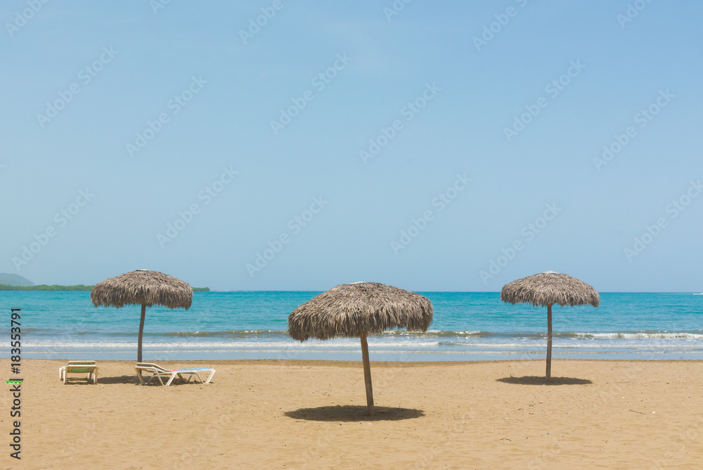 Beach umbrellas on Caribbean sea