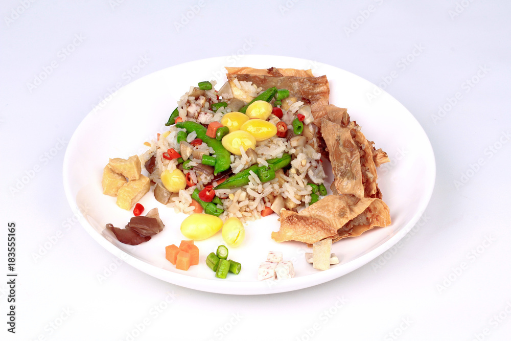 Colorful Fried rice with mixed vegetable served Colorful Fried rice with mixed vegetable served