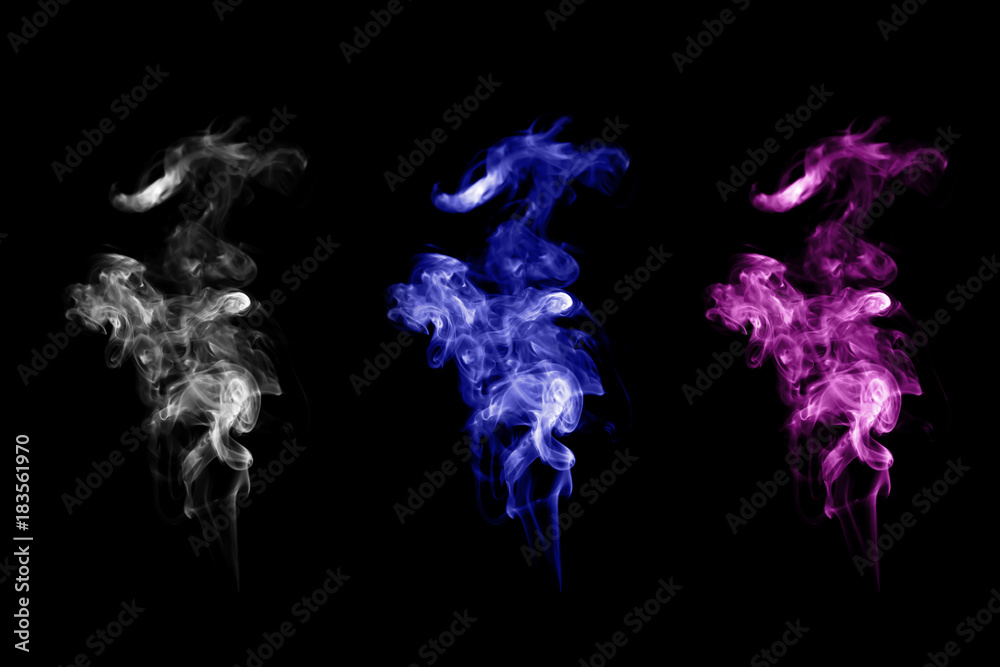 White smoke and colorful smoke on dark black background