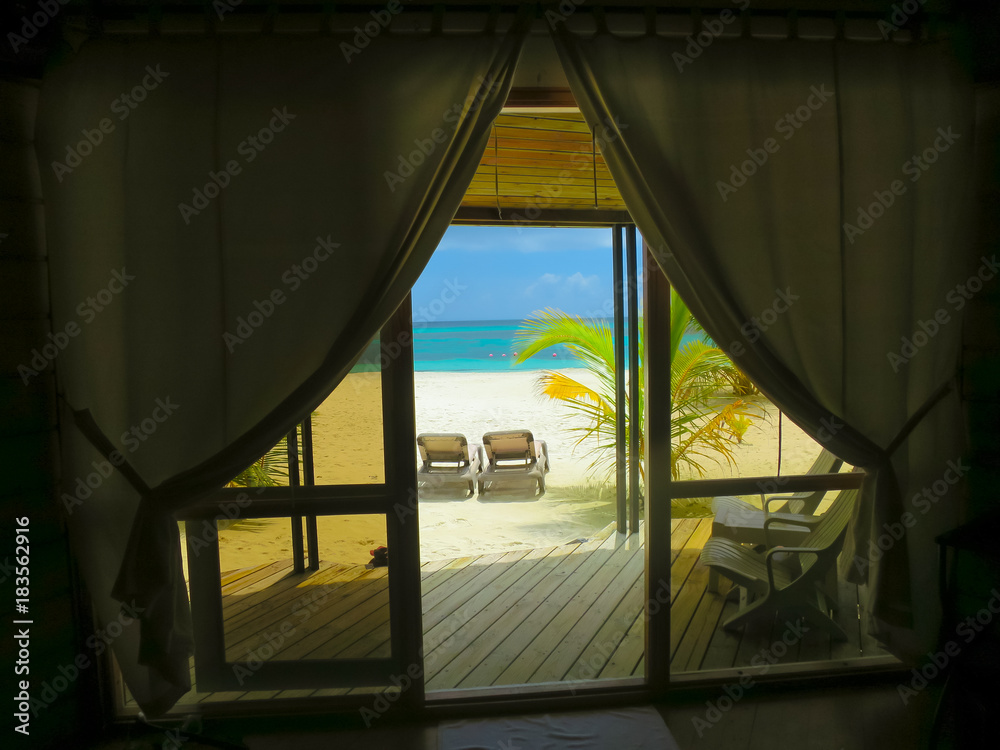 View from hotel room into paradise, Maldives - tropical heaven and peace. View from hotel room into paradise, Maldives - tropical heaven and peace.