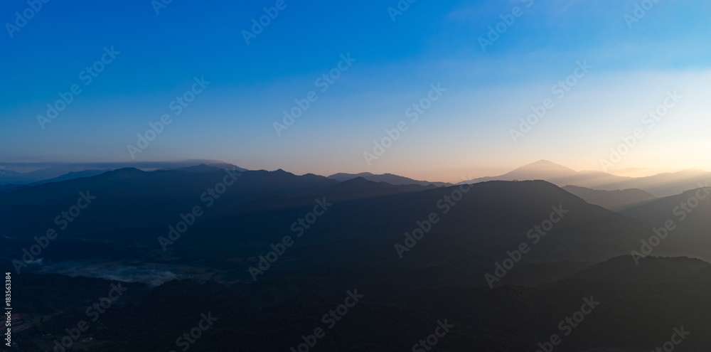 Aerial view of the mountains at sunrise. Beautiful panorama landscape. Laos.