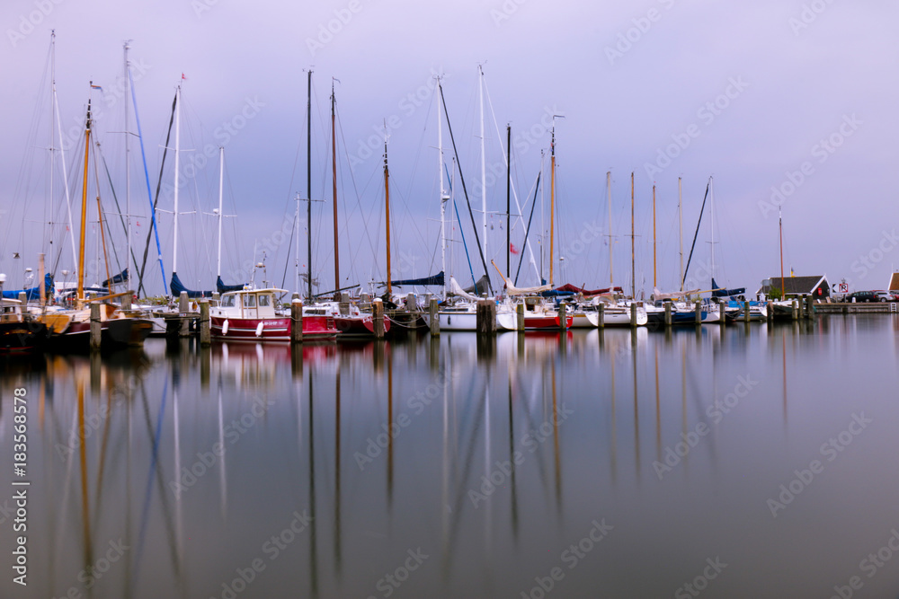 Long exposure of fishing ships in North Holland - Netherlands