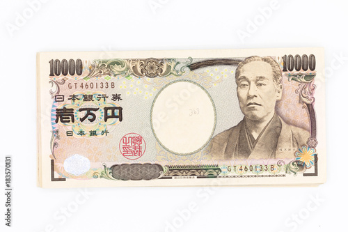 Fototapeta Naklejka Na Ścianę i Meble -  Japanese currency yen bank notes. The yen is the official currency of Japan. It is the third most traded currency in the foreign exchange market after the United States dollar and the euro