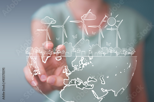 Businesswoman touching and holding renewable energy sketch