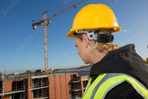 female construction worker at rooftop