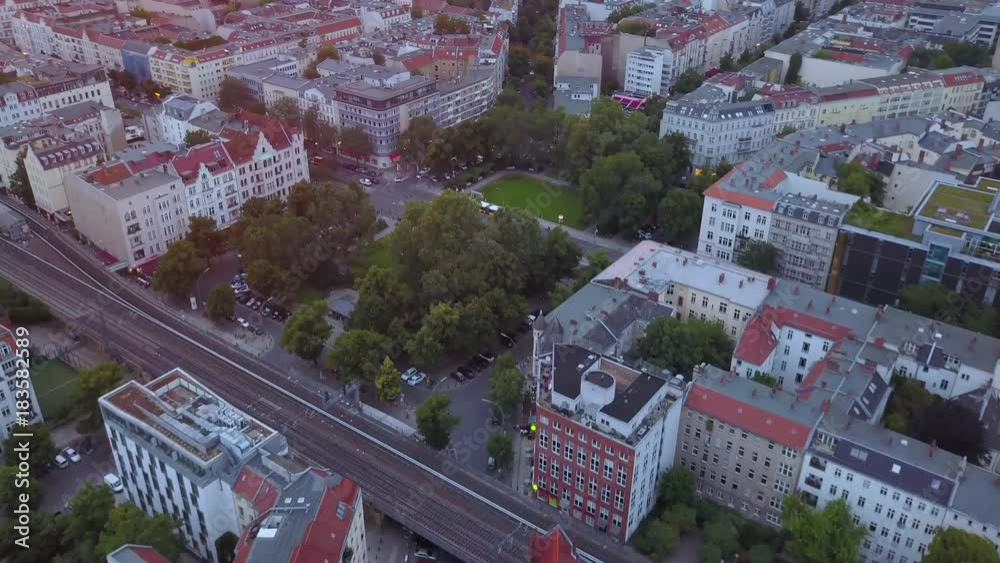 Germany Berlin Aerial v12 Birdseye flying around Savignyplatz park area with sunset views 8/17