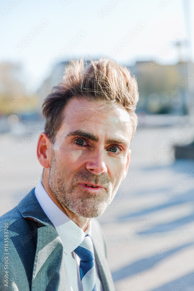 head portrait of a businessman who looks surprised head portrait of a businessman who looks surprised