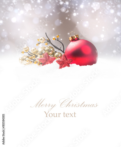Christmas decoration in snow with free space. Celebration balls and other decoration. Christmas concept