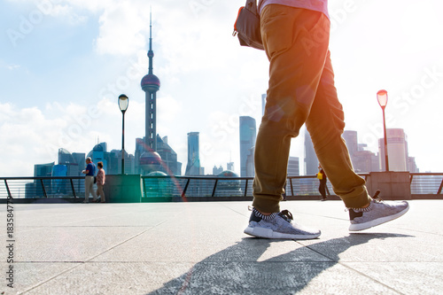 walking man in the summer at bund Shanghai city view background