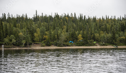 Landscape with a lake Lovozero and tundra forest photo