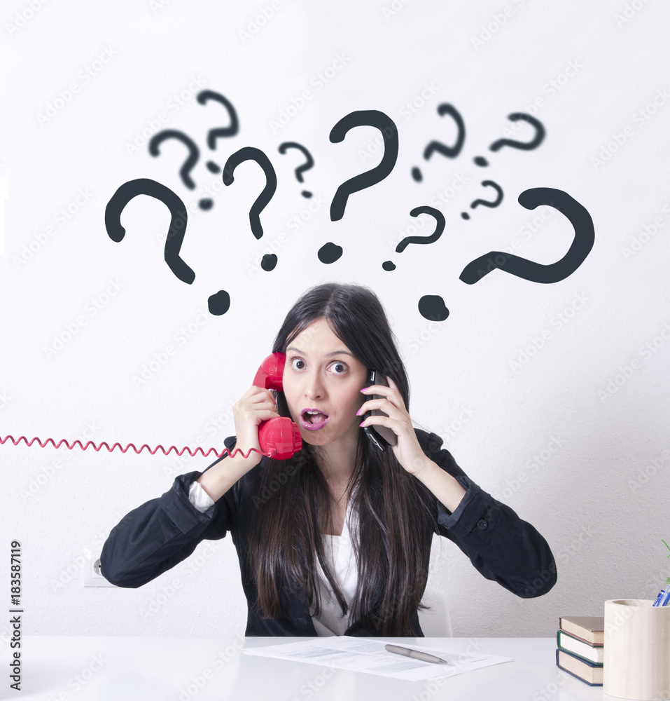 woman in the office with problems and stress on the phone