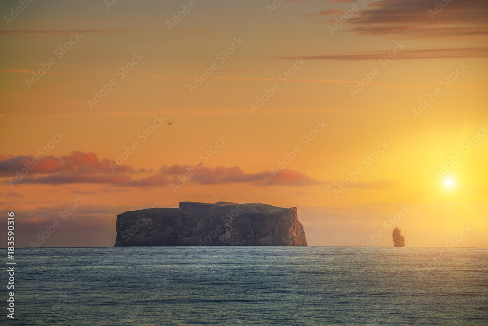Coast of the Atlantic Ocean in the early morning. The smooth water and amazing rocks on the horizon, the gentle pink dawn light. Iceland.
Coast of the Atlantic Ocean in the early morning. The smooth water and amazing rocks on the horizon, the gentle pink dawn light. Iceland.