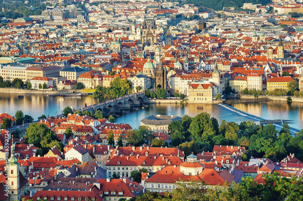.Panoramic view of the evening Prague, the Vltava River and Charles Bridge. Czech Republic.