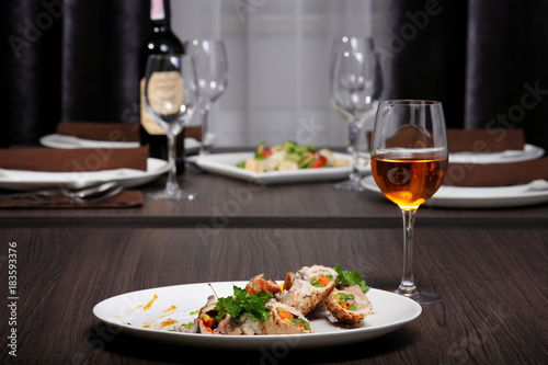 luxury dinner served on the table with glass of wine