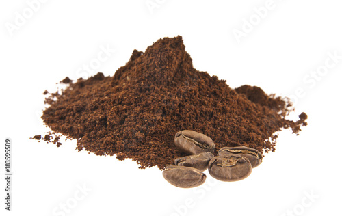 Ground coffee and grains isolated on white background