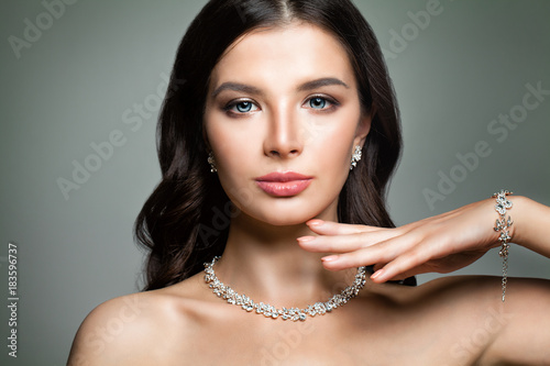 Beautiful Woman with Jewelry Diamond Necklace. Perfect Face