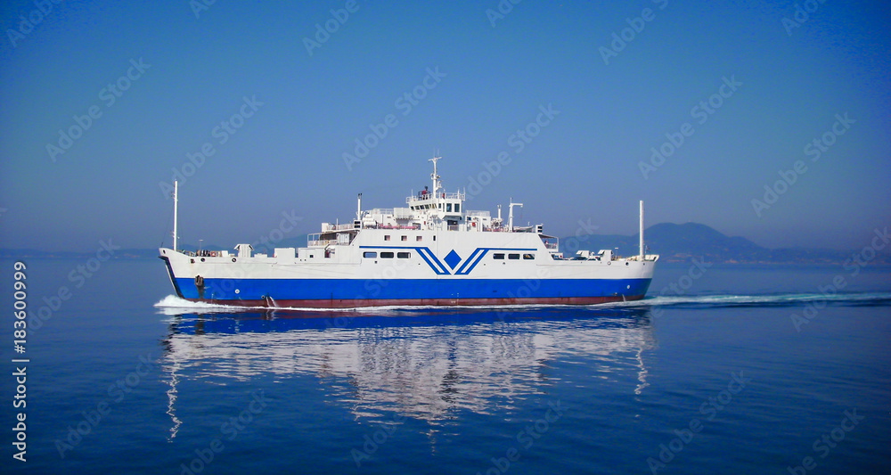 big transportation ferryboat sailing in blue calm water