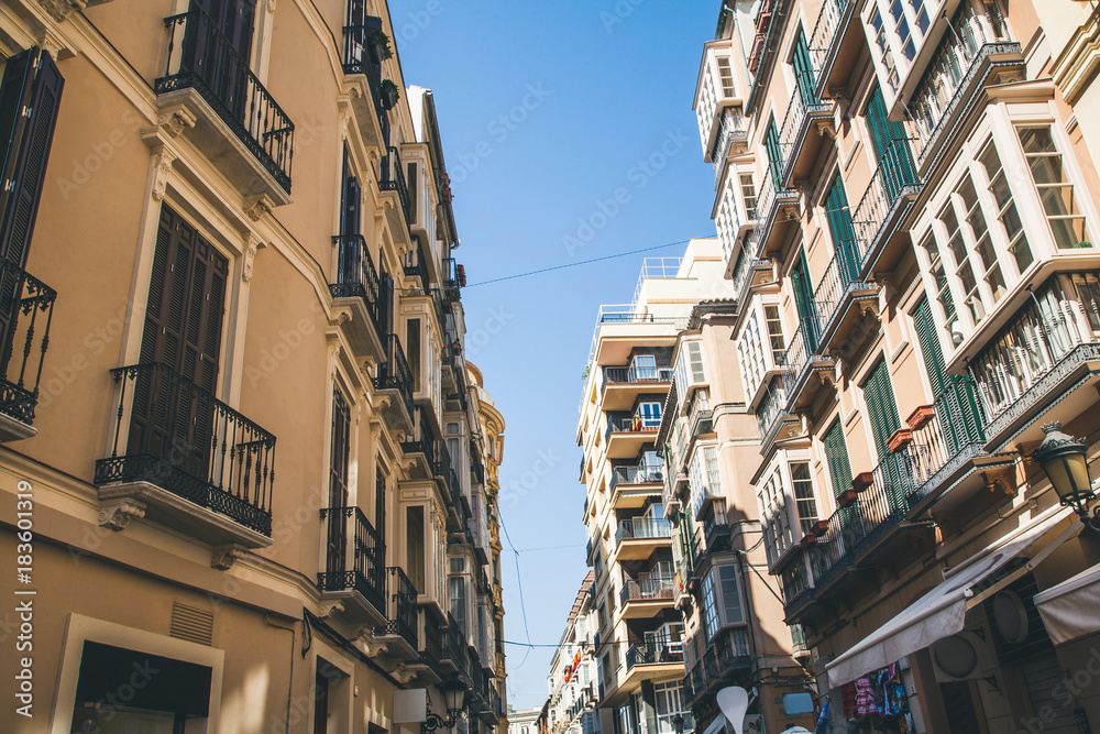 low angle view of buildings on street, spain