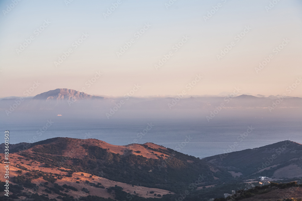 scenic view of beautiful mountains landscape with sea and fog, spain
