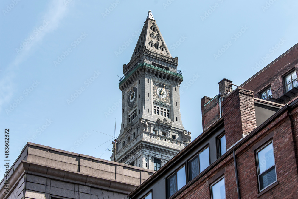 View of the historic Custom House skyscraper clock tower in skyline of Boston Massachusetts USA