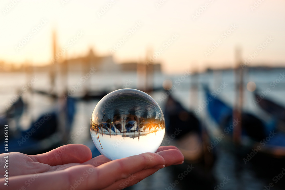 Venice gondola view through crystal glass ball