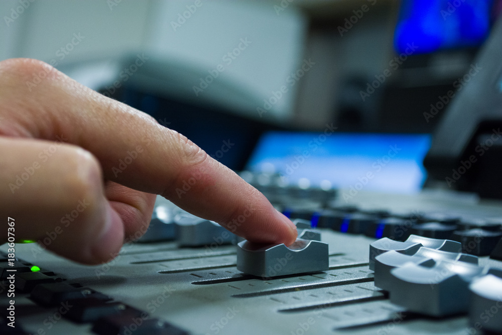 hand on a light, mixing desk fader in blur television gallery hand on a light, mixing desk fader in blur television gallery