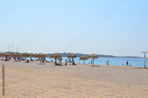 Fototapeta Naklejka Na Ścianę i Meble -  people relaxing on European beach