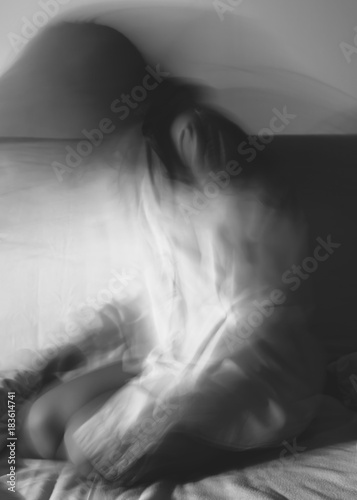 Silhouette of a girl,motion blur.Black and white.