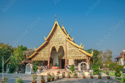 traditional buddhist temple with gemstones decorations in thailand.