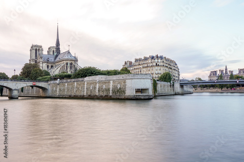 Long exposure river and cathedral of Saint Michel Notre Dame, Paris, France, Europe. Beautiful water and light color. best-known church buildings in the Catholic Church in the world. best for tourist.