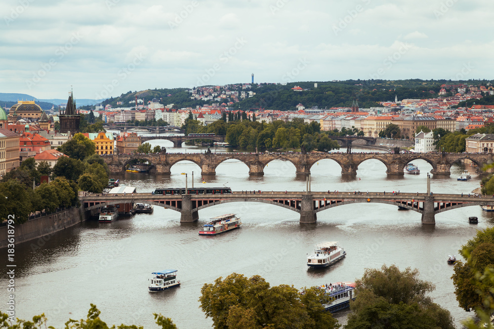 Panoramic view on Vltava river and historical center of Prague, buildings and landmarks of old town, Prague, Czech Republic Beautiful Prague in cloudy weather.