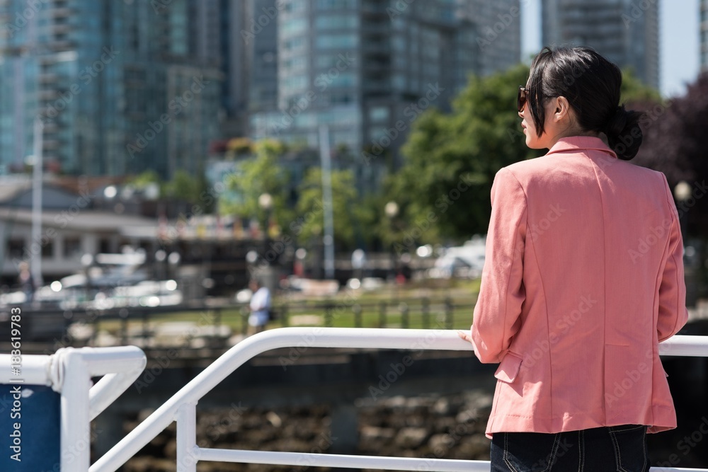 Asian woman looking away in the ferry Asian woman looking away in the ferry