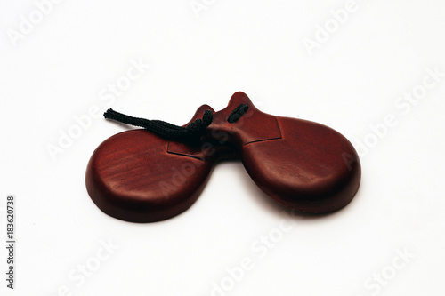 Wooden Spanish castanets on a white background
