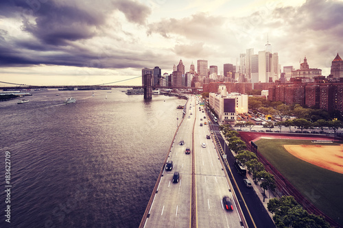 Dramatic sunset over Manhattan  color toned picture  New York  USA.