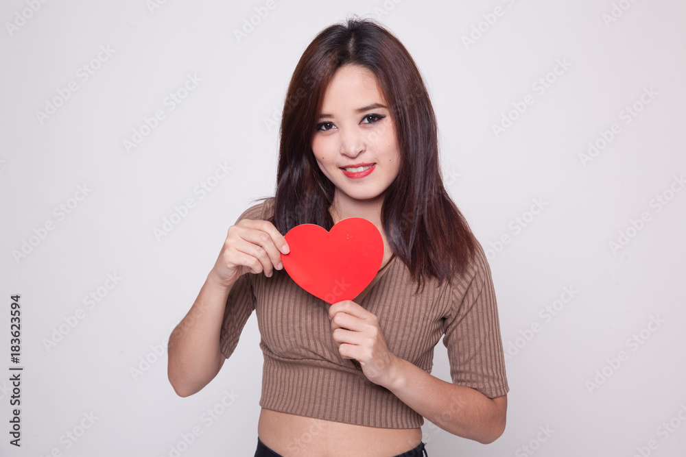 Asian woman with red heart. Asian woman with red heart.