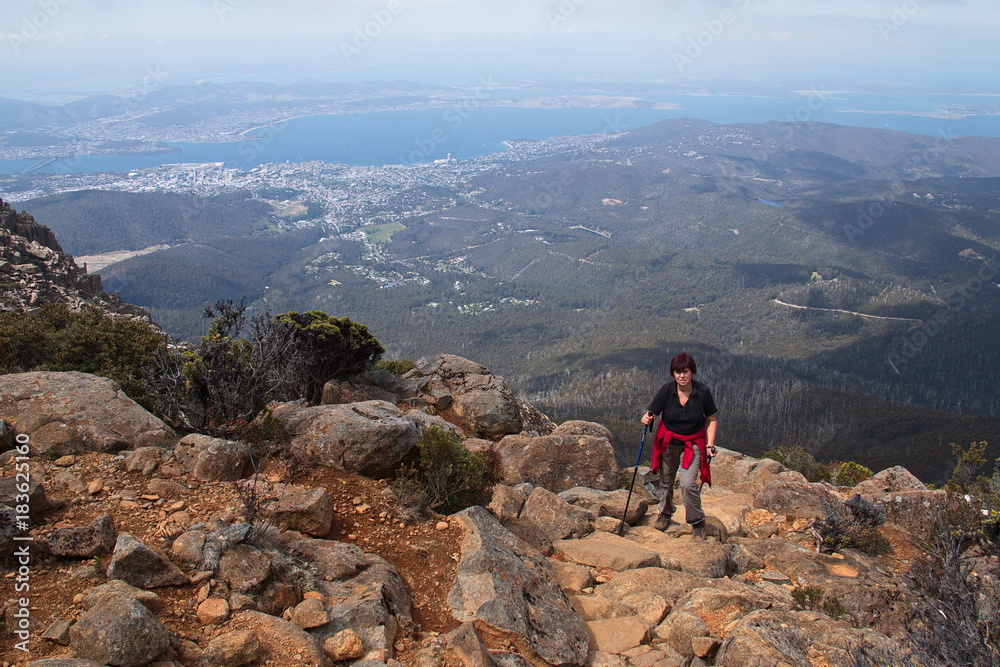Tourist on hiking track on Mount Wellington in Tasmania
