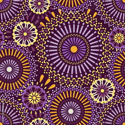Seamless pattern with mandalas in the African style.