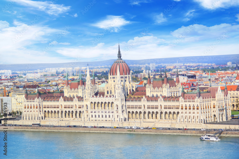 Fototapeta premium Beautiful view of the Hungarian Parliament on the Danube waterfront in Budapest, Hungary