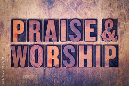 Praise  & Worship Theme Letterpress Word on Wood Background