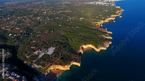 video contains drone shoots of the famous Benagil Cave and ocean coast (Algar de Benagil) in Algarve, Portugal. photo