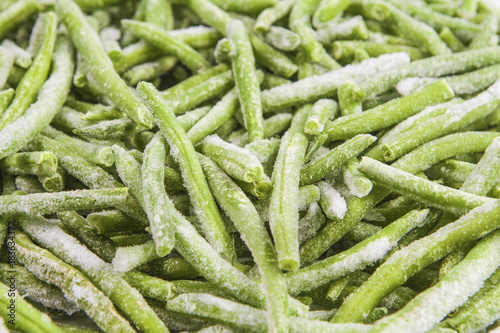 Frozen green beans as background, closeup