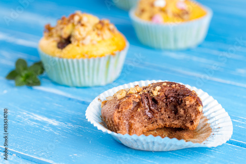 Fresh muffins with nuts and chocolate