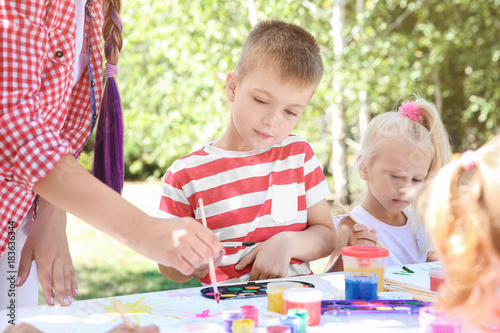 Children at painting lesson...
